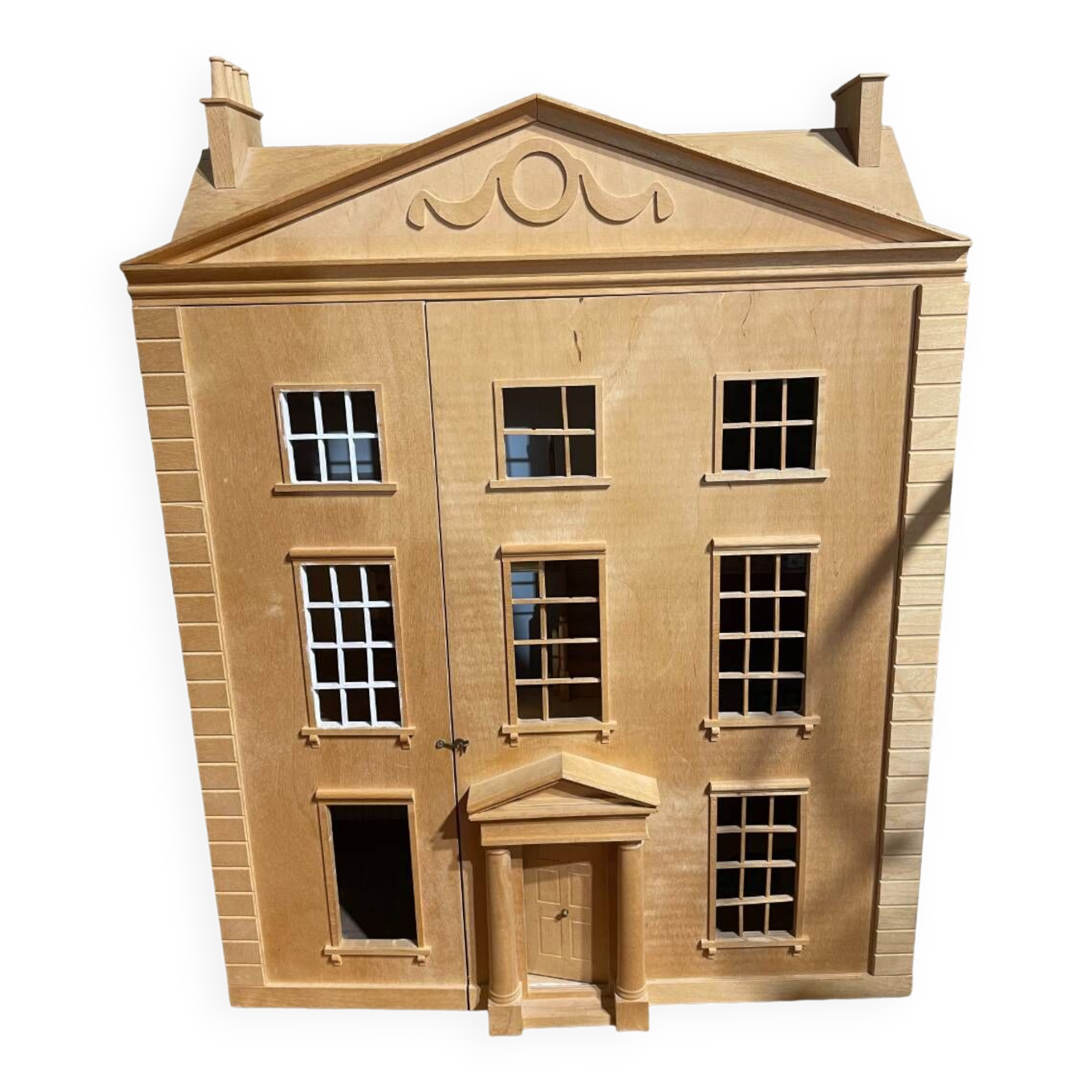 Large wooden dollhouse with miniature furniture