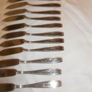 Lot of 12 metal fish cutlery sets.