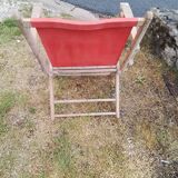 Fauteuil de jardin ancien en bois et tissu rouge