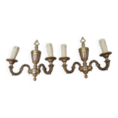 2 antique 2-branch wall lights in gilded brass in the Louis XVI style.