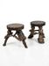 Pair of tripod stools with vine legs, oak top.