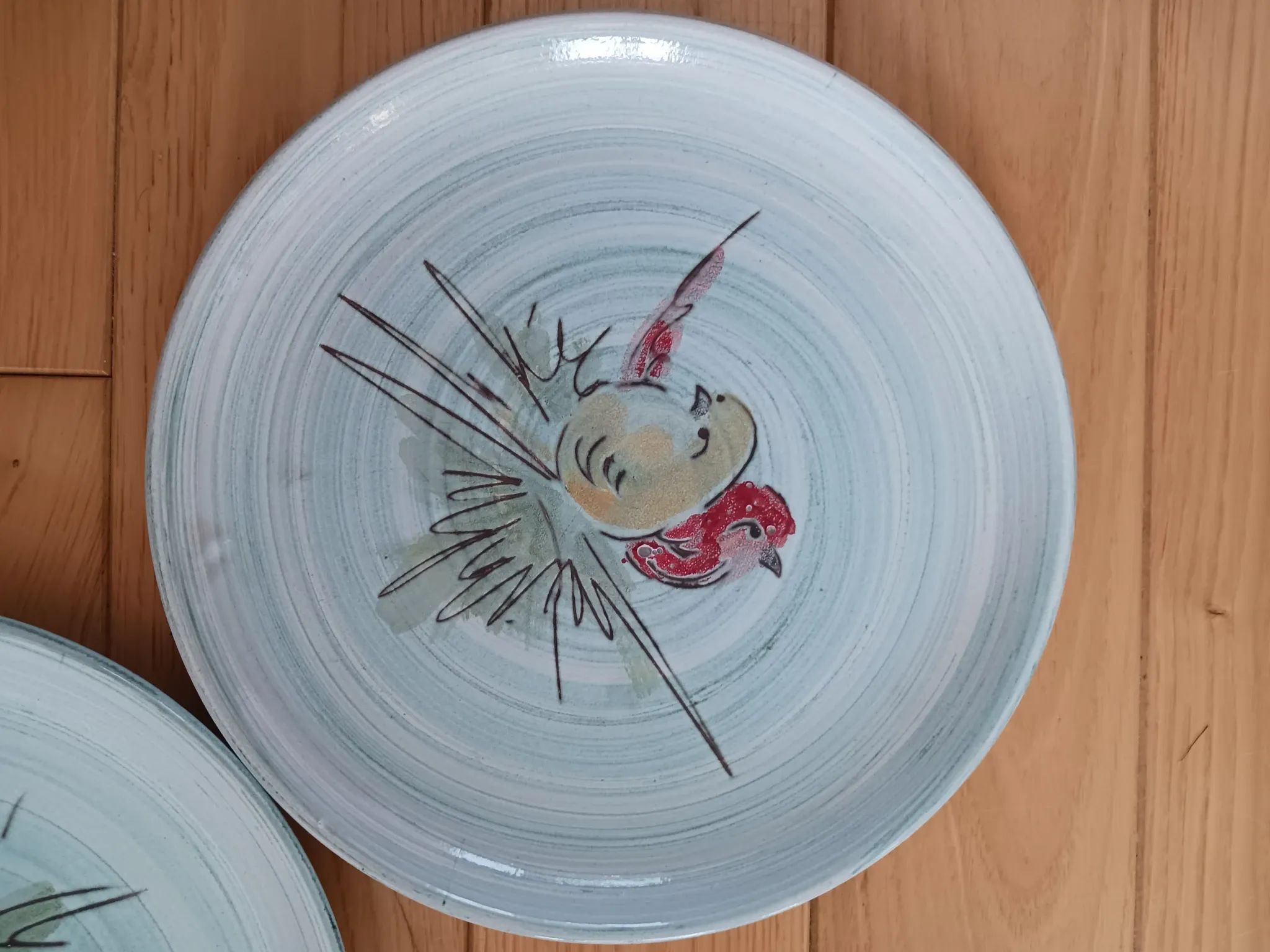 Glazed ceramic plates, signed Camos Vallauris.