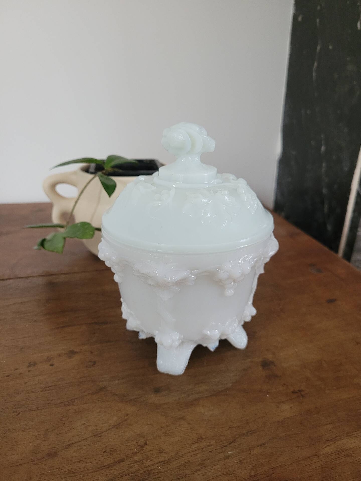 White opaline bonbonnière with floral decoration