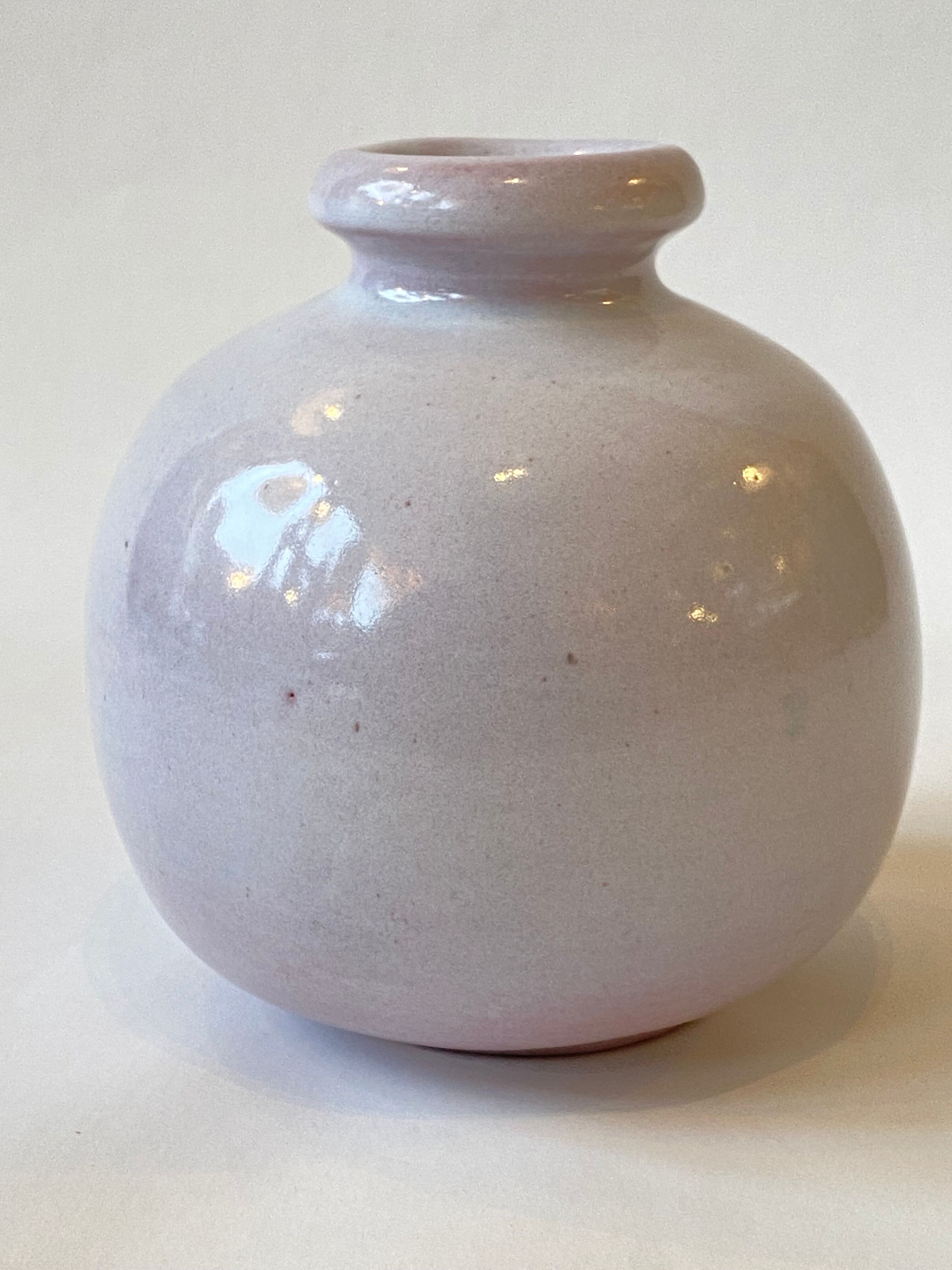 Ceramic vase by Jean and Robert Cloutier with fish decoration