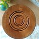 Low wood tripod stool turned countryside