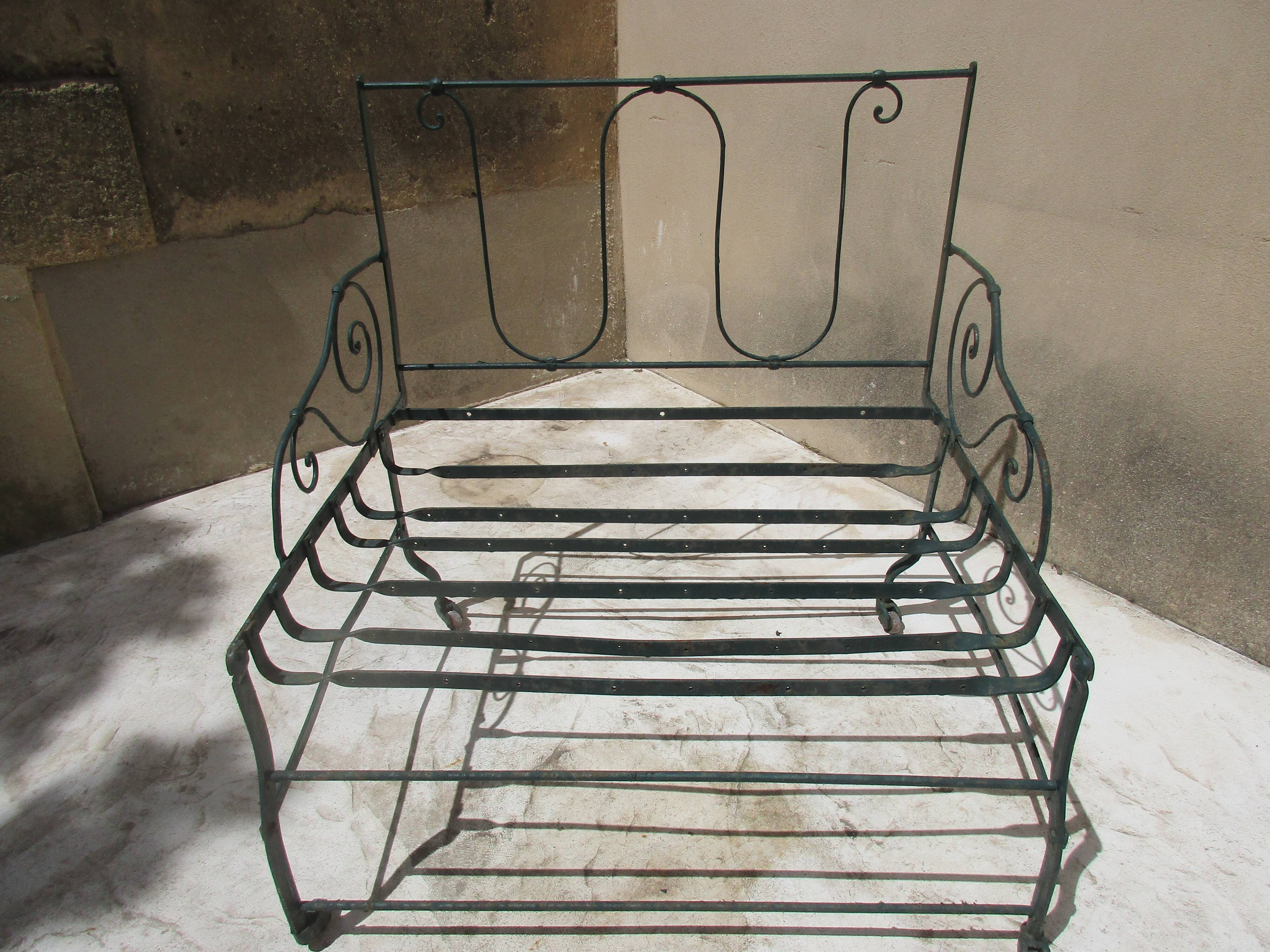 Pair of iron garden chairs forge