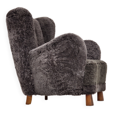 Années 1960, design danois, fauteuil rembourré, véritable peau de mouton.