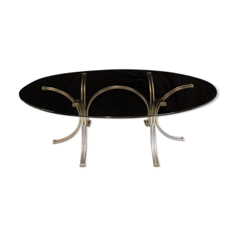 Oval glass table smoked feet chrome steel arches