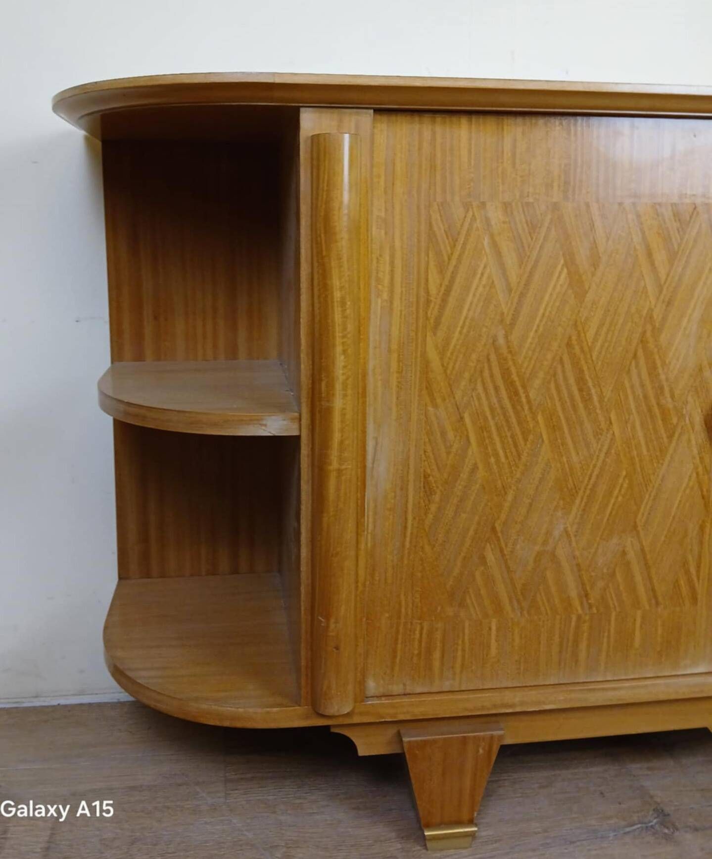 According to Jules Leleu: Rare corner sideboard in light wood, Art Deco period, circa 1930