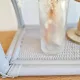 Grey vintage rattan shelf