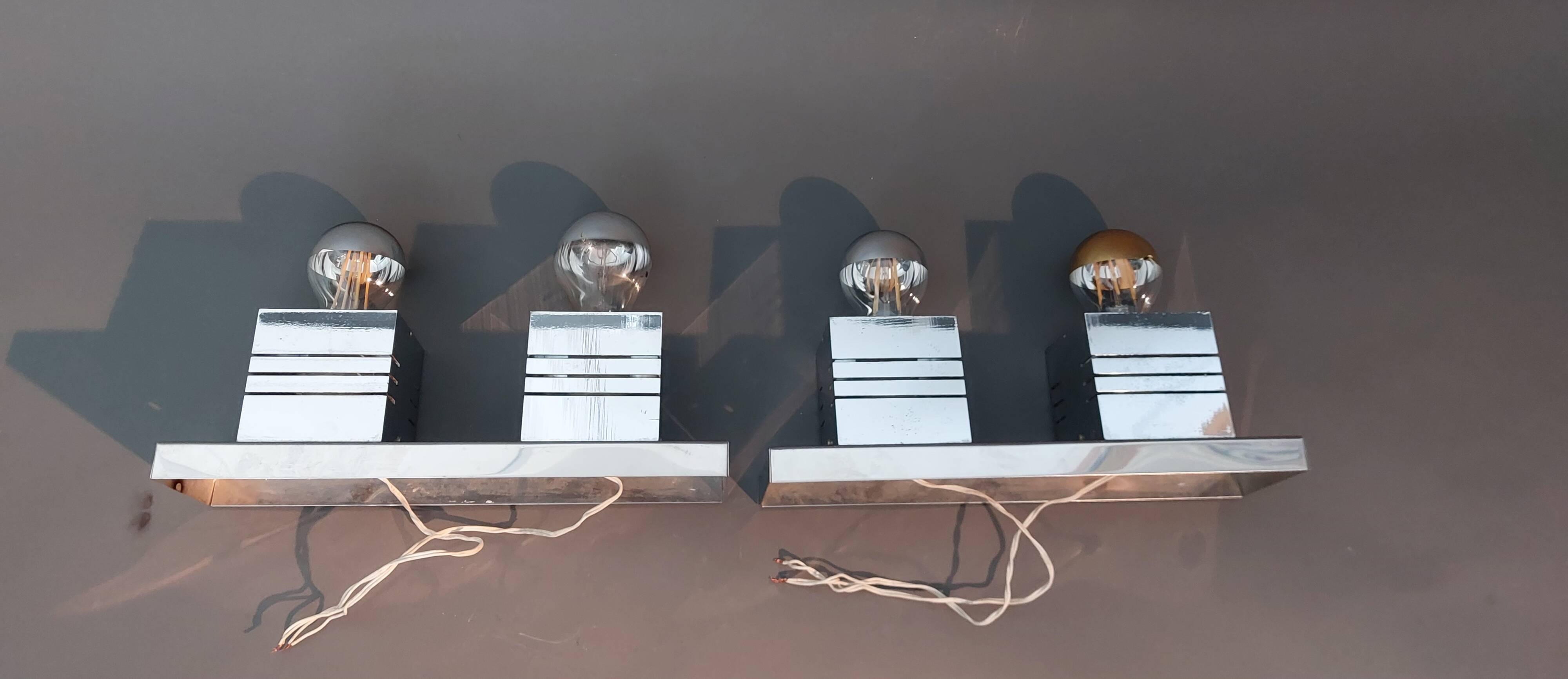 Pair of Spage Age 1970 chrome wall lights.
