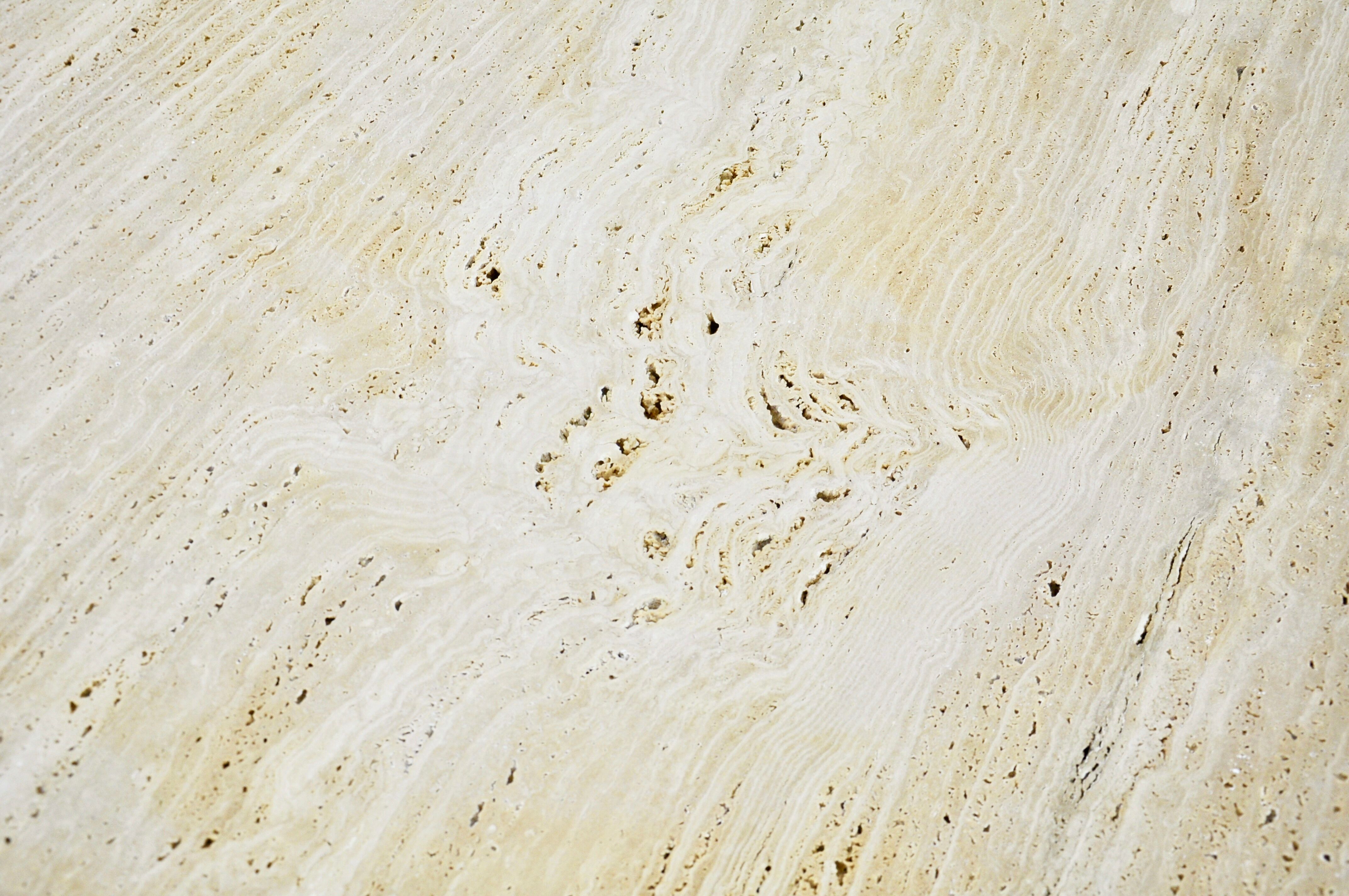 Circular travertine dining table