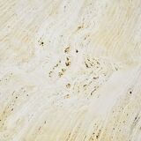 Circular travertine dining table