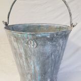 Old bucket with thick zinc handle