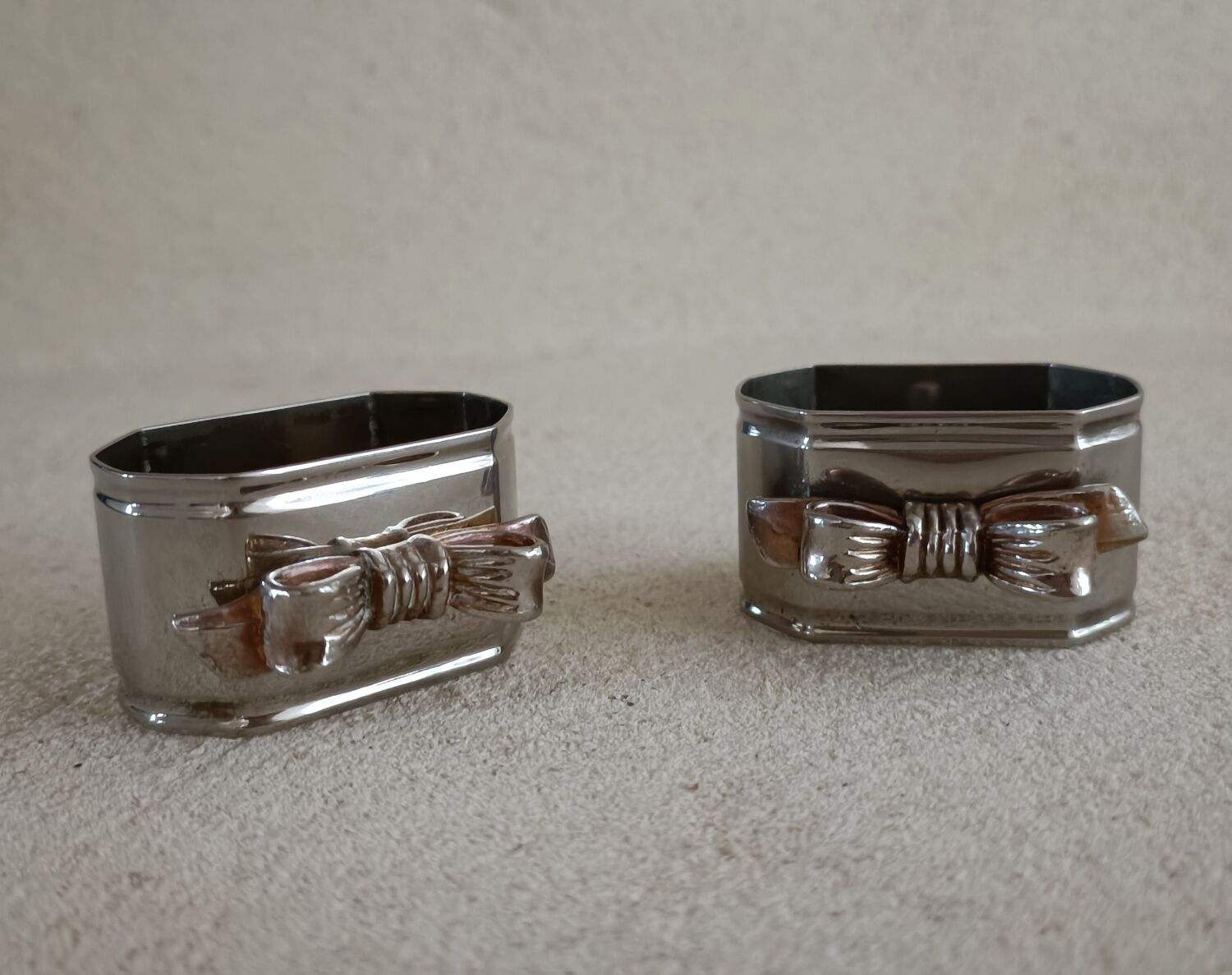2 silver metal towel rings