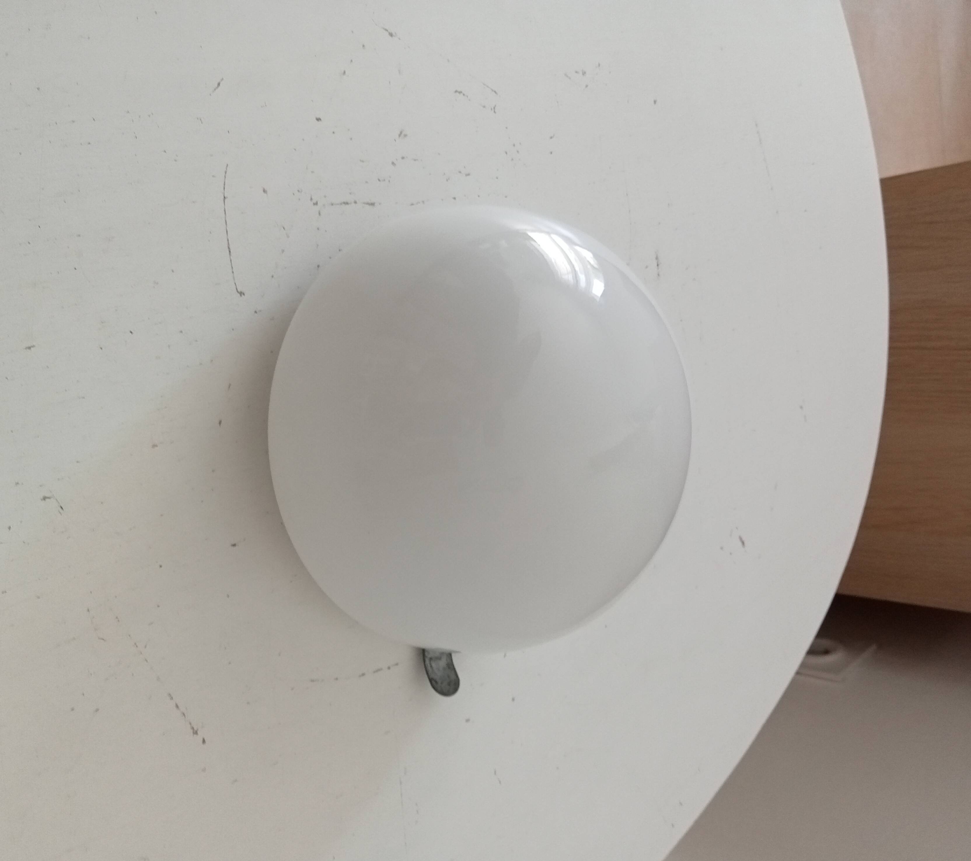 Vintage opaline wall light from the 1960s.