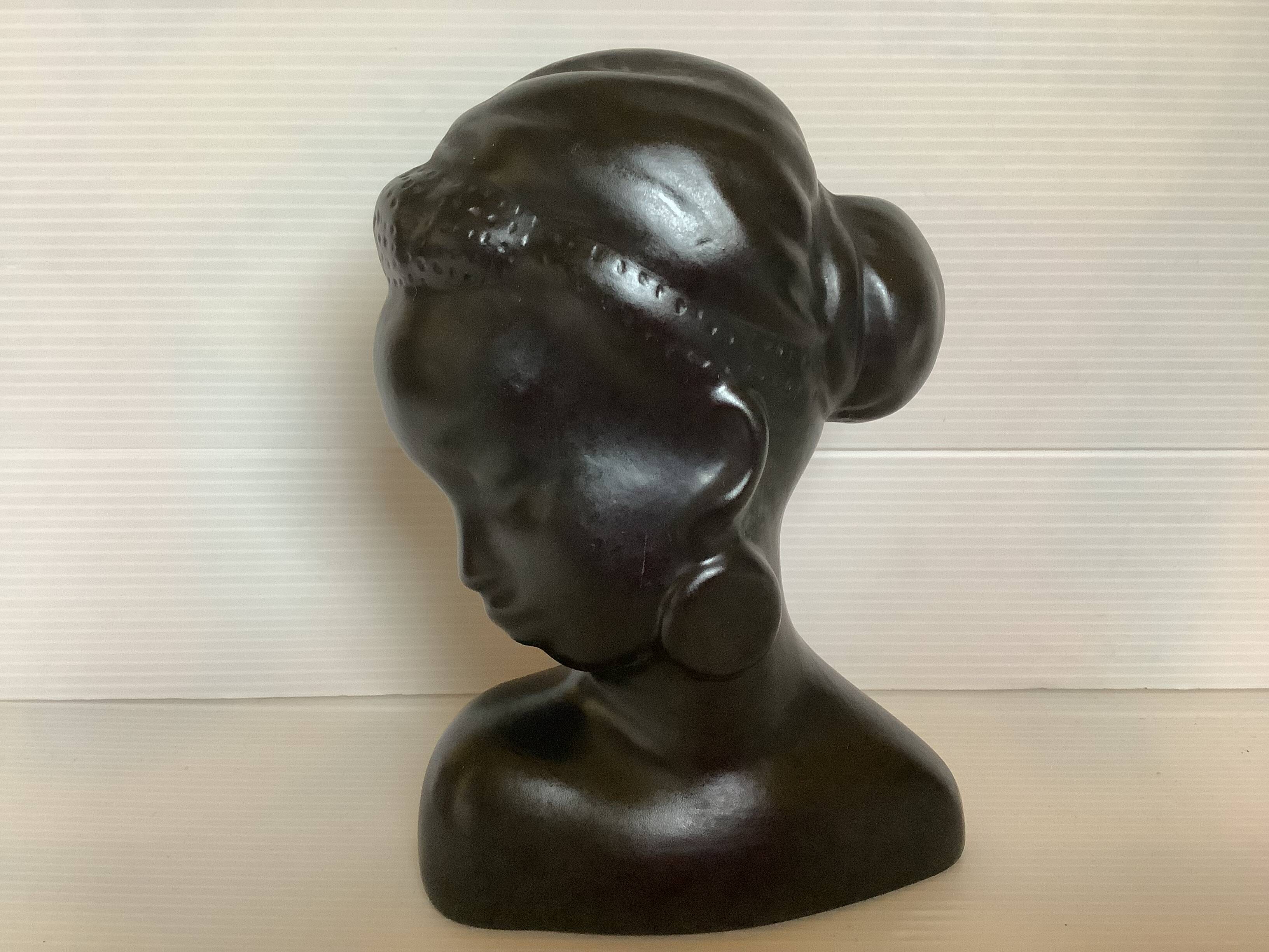 Antique bust of an African woman to stand or hang