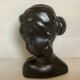 Antique bust of an African woman to stand or hang