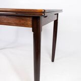 Dining table in rosewood with extentions, of danish design from the 1960s.