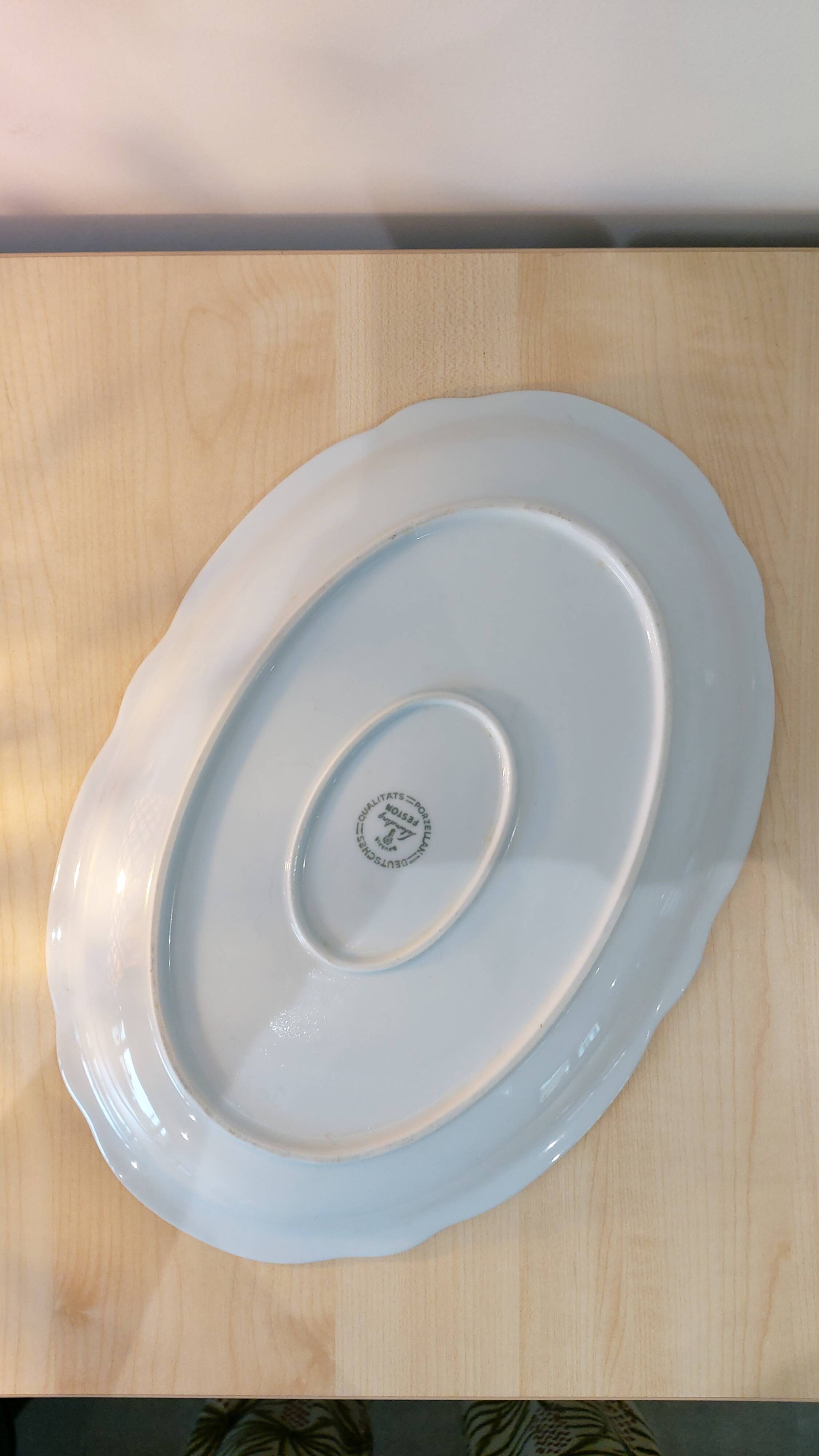 Oval porcelain plate white with gold edging