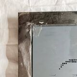 Vintage wall mirror in varnished steel decorated with a rose in relief