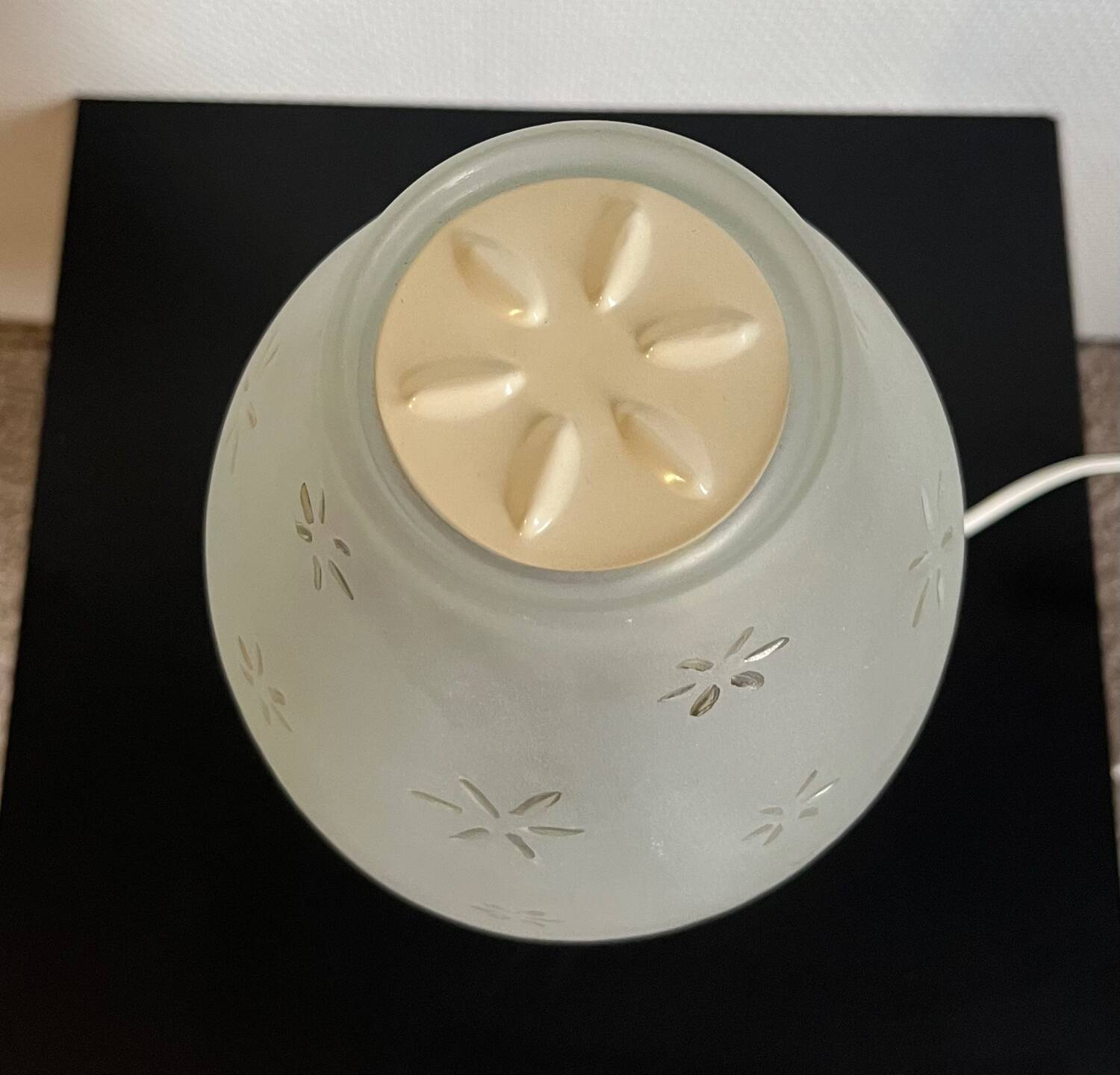 Metal foot lamp with thick glass lampshade