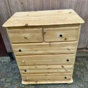 High Scandinavian chest of drawers stripped in solid pine from the 1980s.