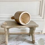 Set of three glazed ceramic pitchers