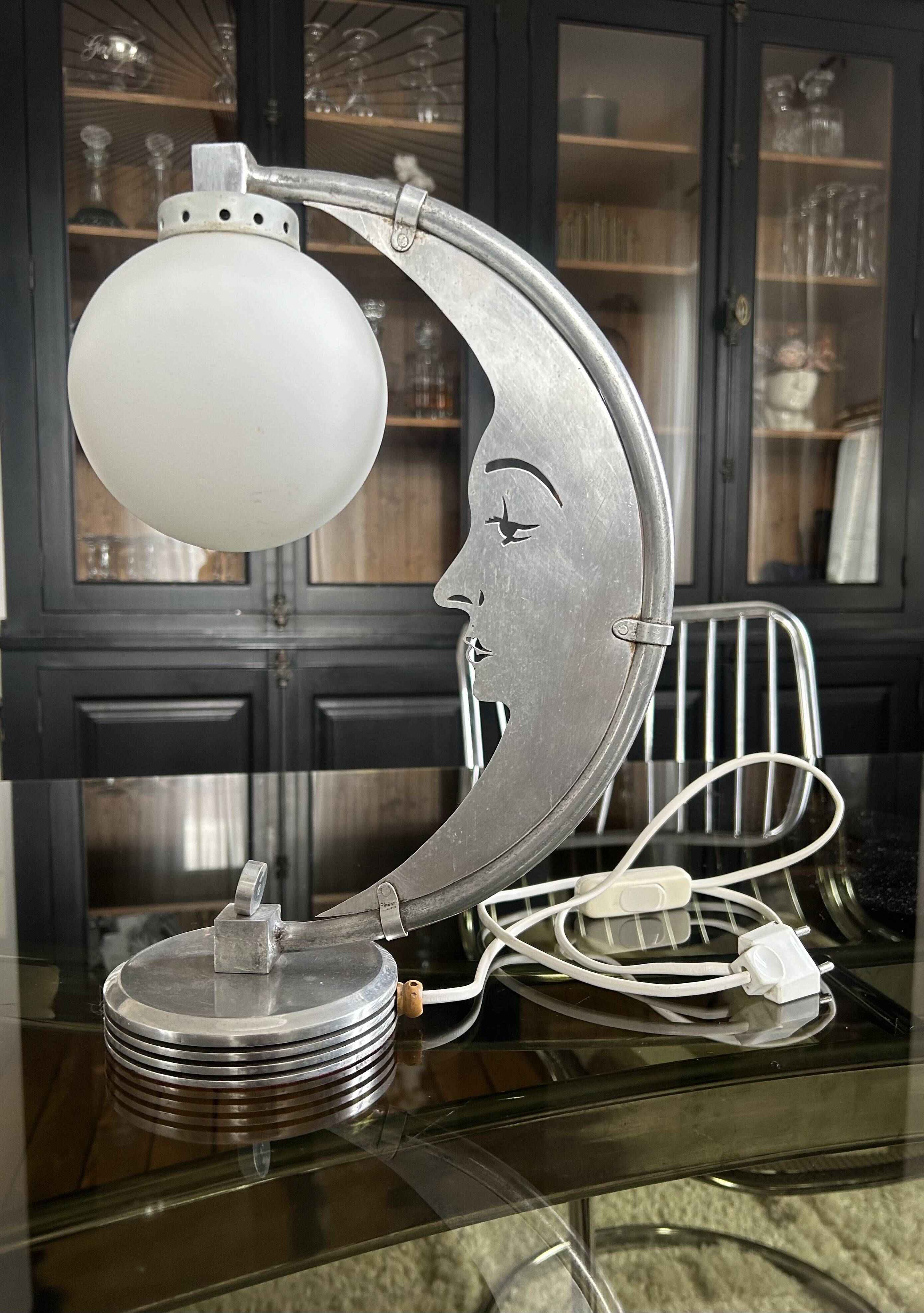 Moon lamp with face in aluminum and white opaline circa 1930