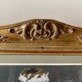 Old gilded carved wooden wall frame