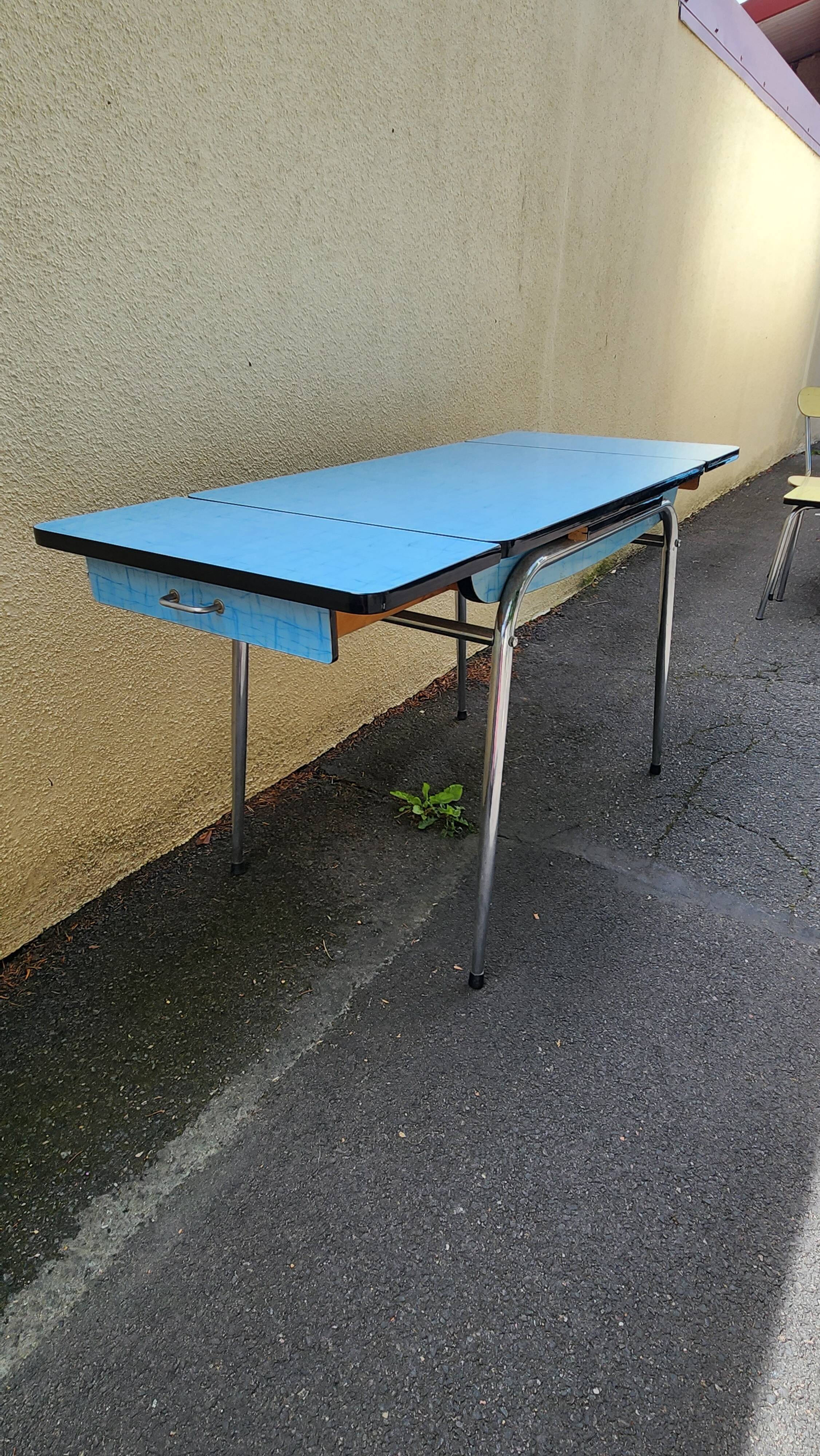 Vintage set from the 60s/70s: table, chairs, and marbled Formica stools.