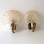 Pair of vintage shell glass wall lights, Art Deco style fixtures.
