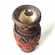 Vase espagnol en bois sculpté et cordage rouge