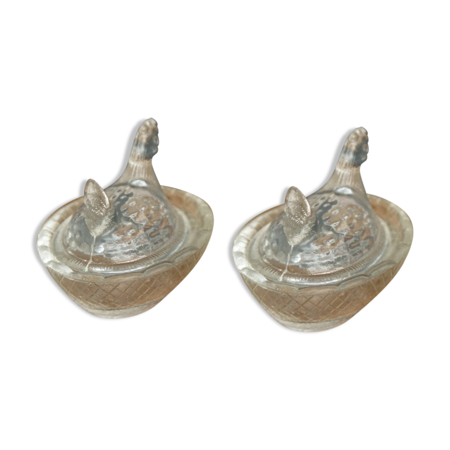 Pair of "chicken" salerons made of molded glass