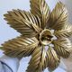 Gold metal flower wall light
