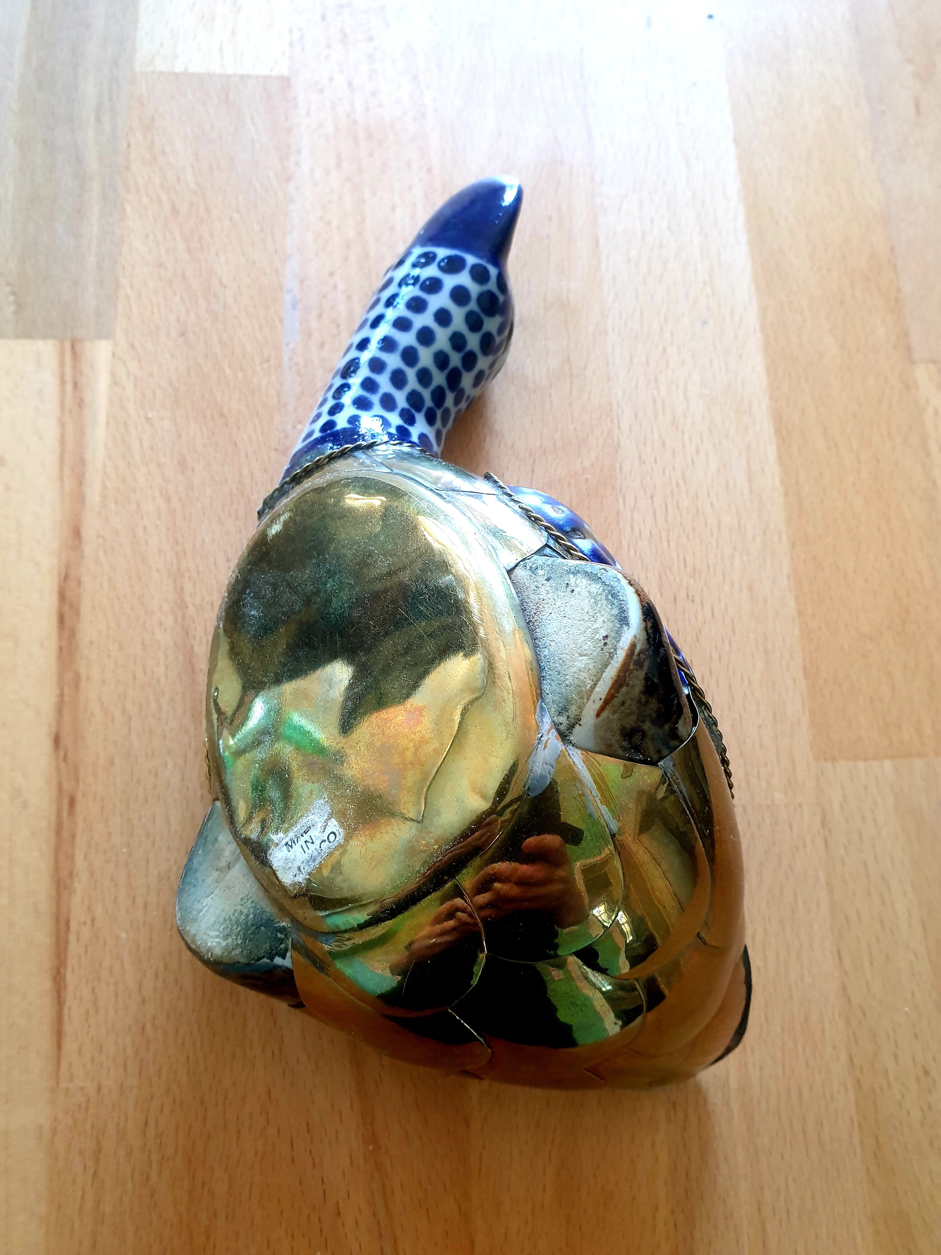 Brass duck and ceramics