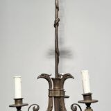 Empire-style bronze chandelier with 3 arms of light topped with eagle heads. French work. Circa 1900.