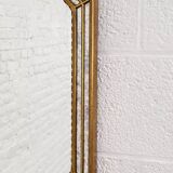 Octagonal mirror in Venetian style with gold-rimmed parecloses