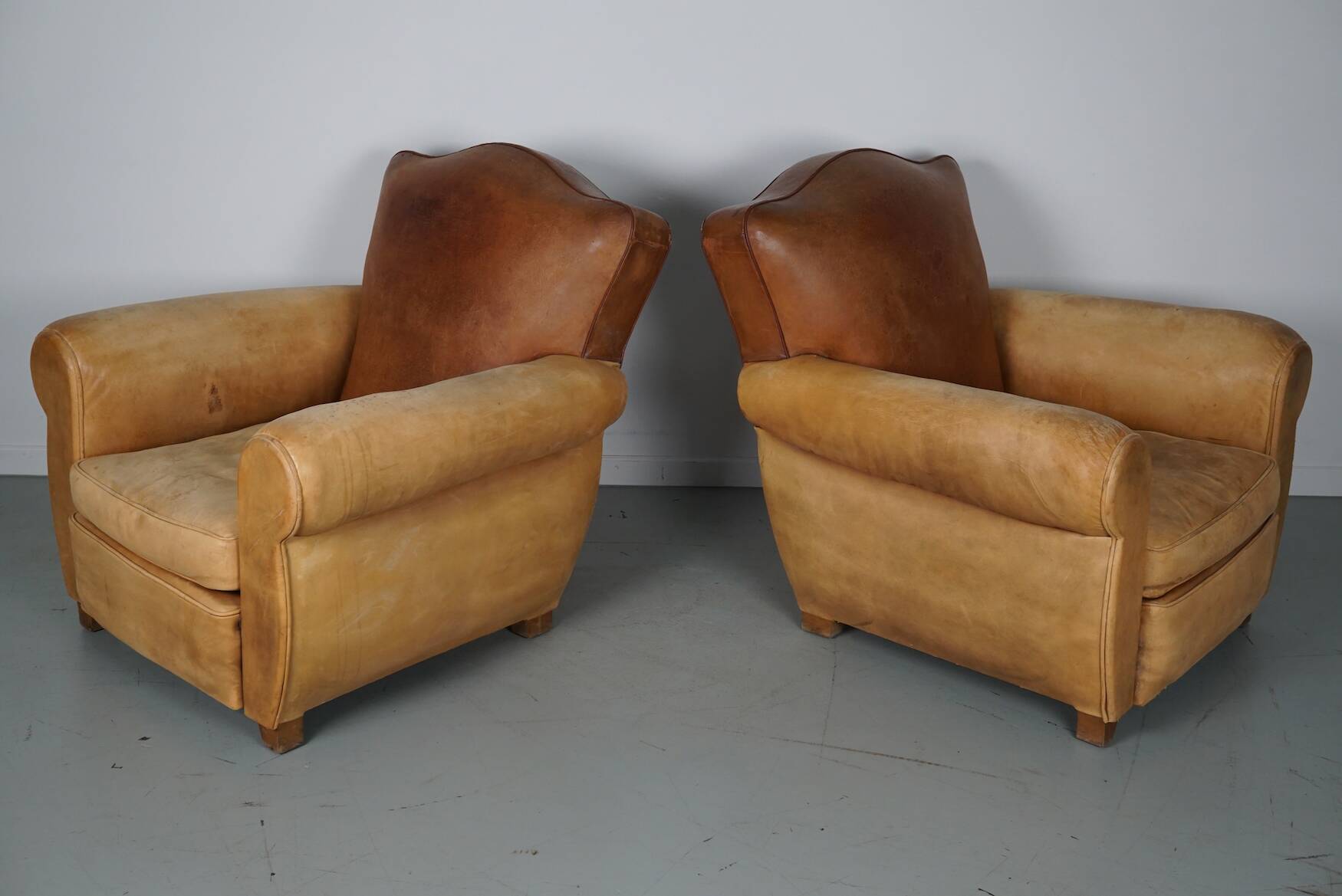 Pair of French Cognac Moustache Back Leather Club Chairs, 1940s
