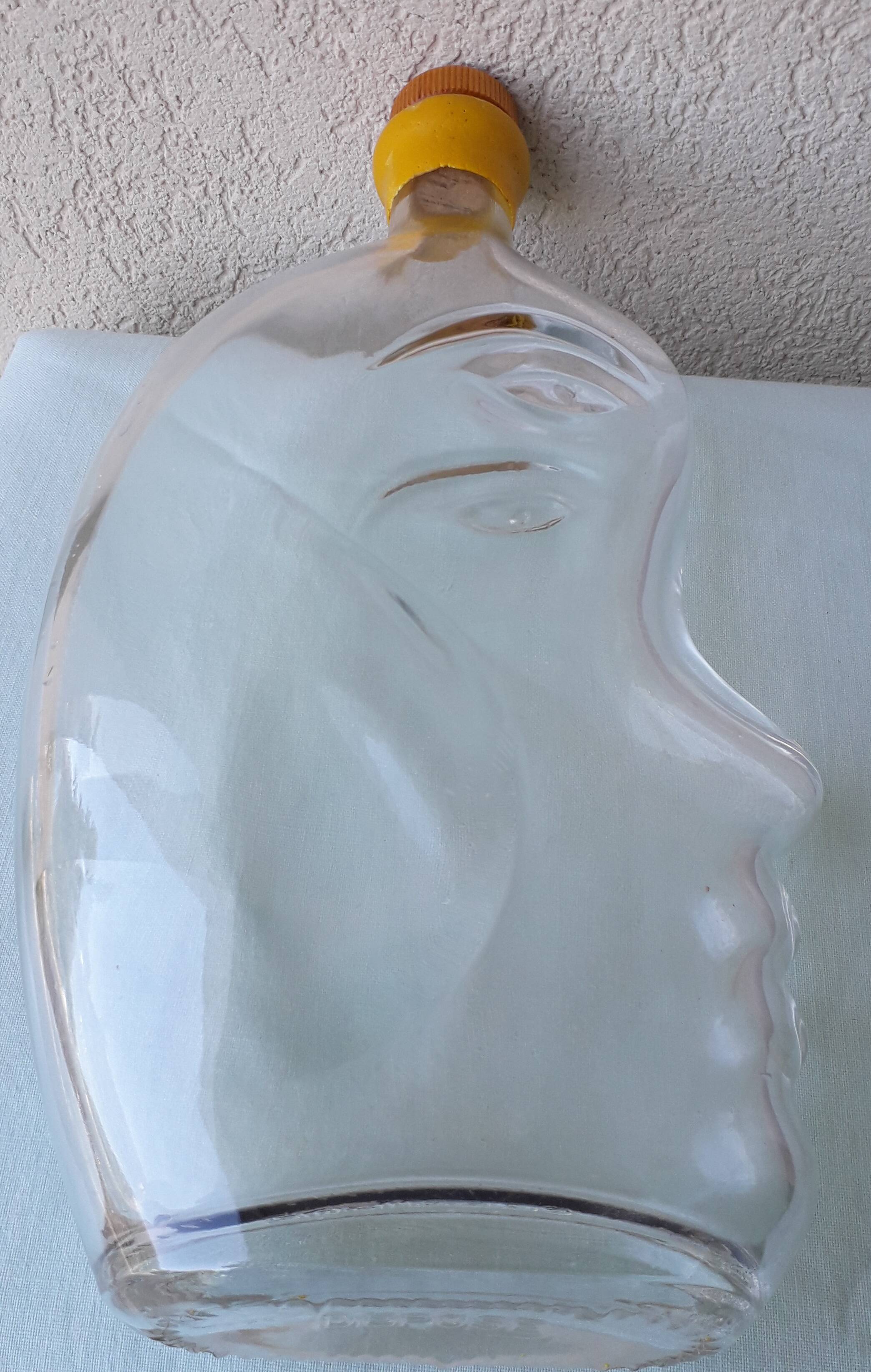 Bouteille anthropomorphe en verre