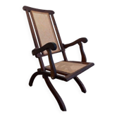 Antique folding chair with weaved seat/back