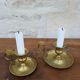 Old pair of brass candlesticks cellar rats