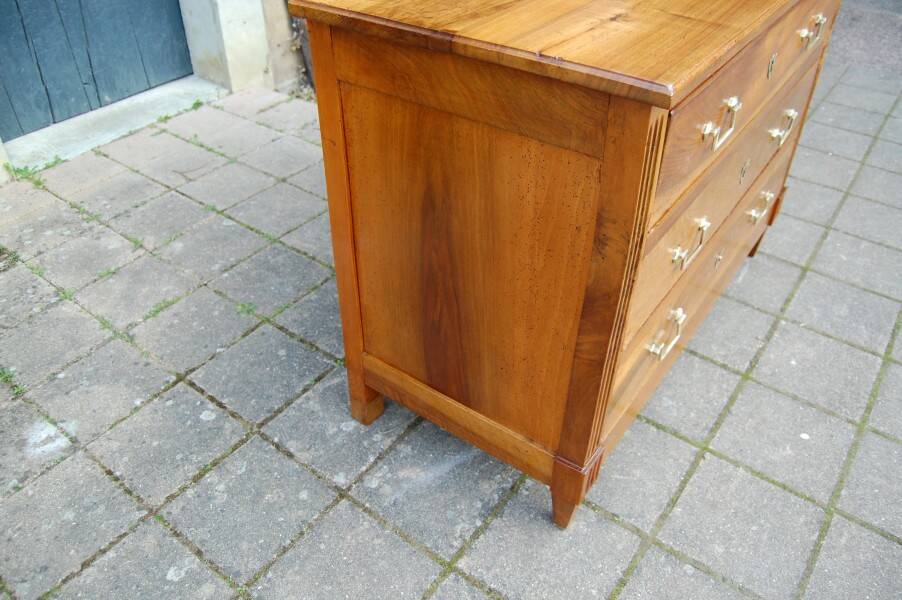18th-century Louis XVI low walnut commode.