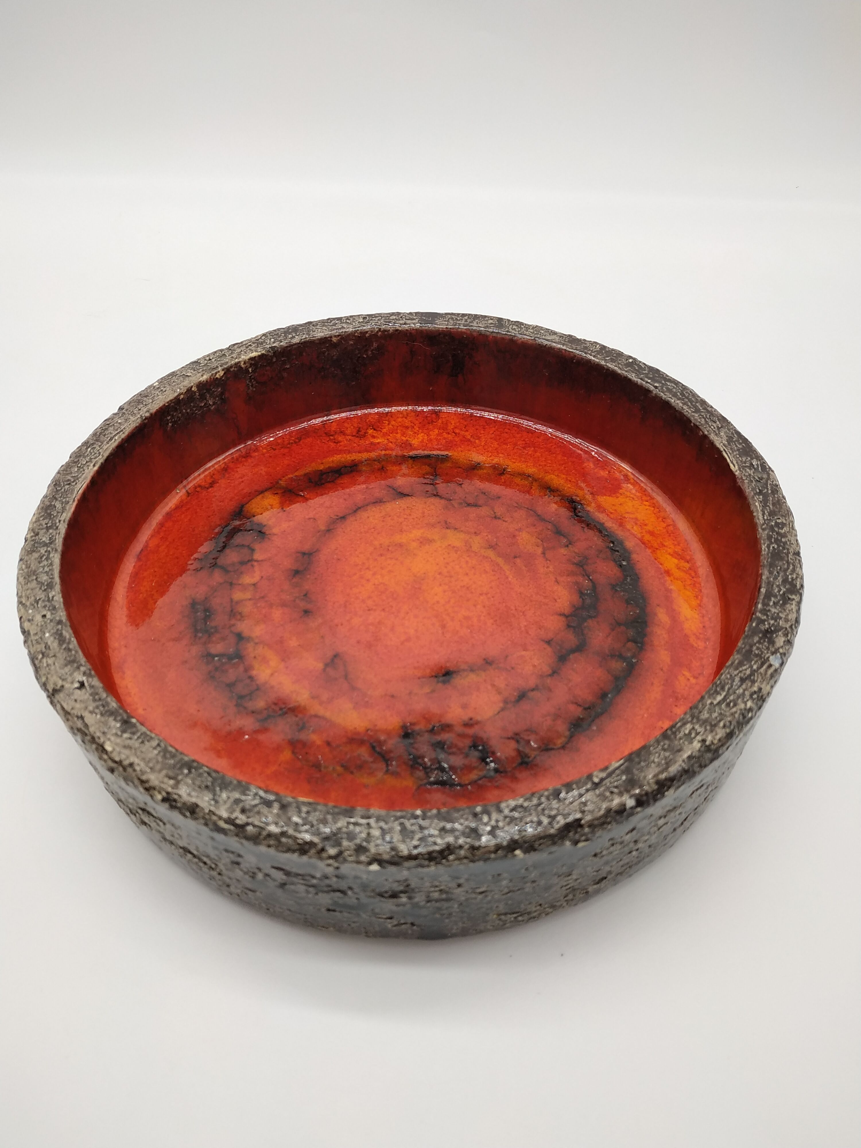 Brutalist cut in orange and red enamelled sandstone