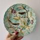 Set of 3 antique plates in majolica with bird designs.