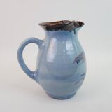 Large blue pitcher with abstract pattern