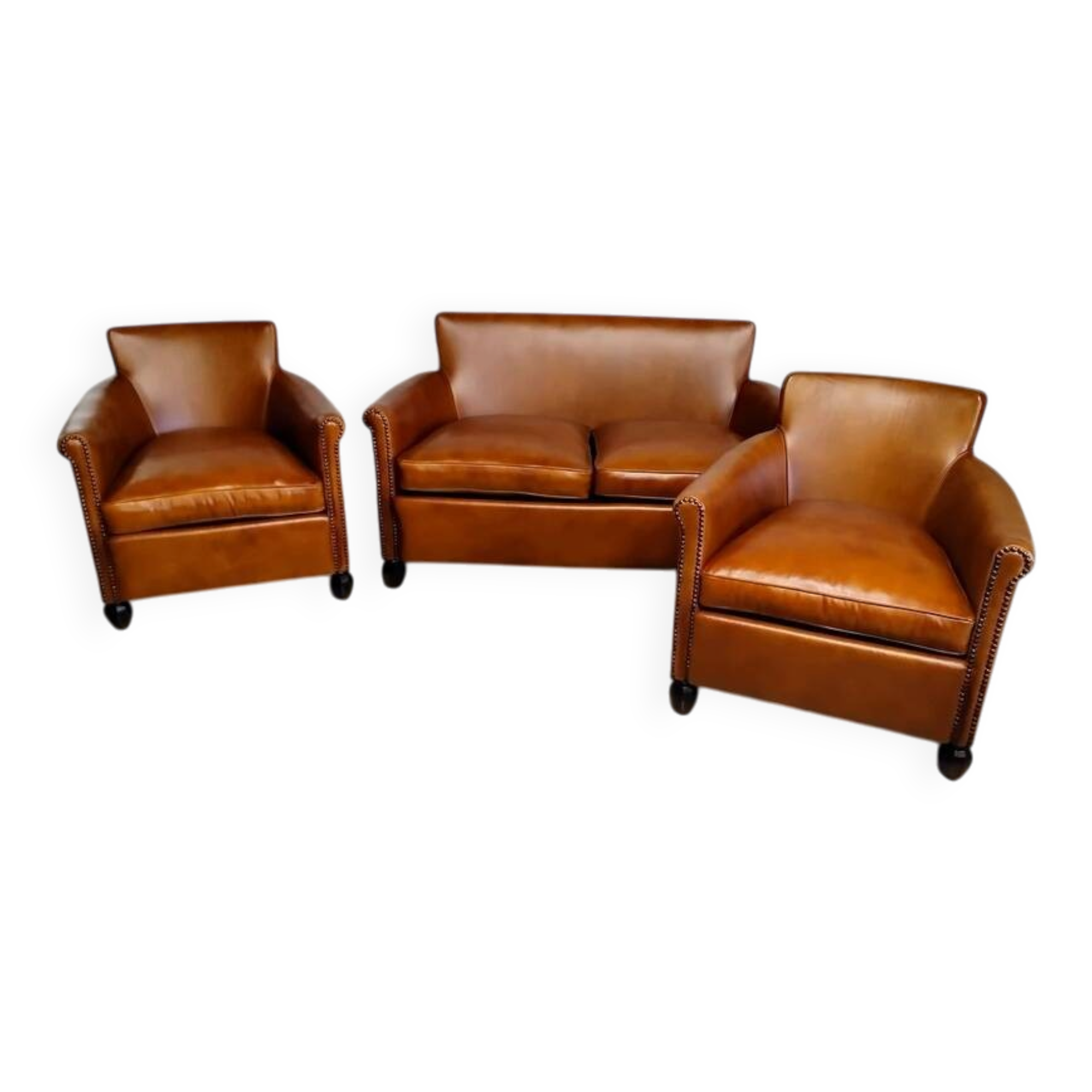 Living room sofa and its 2 club armchairs.