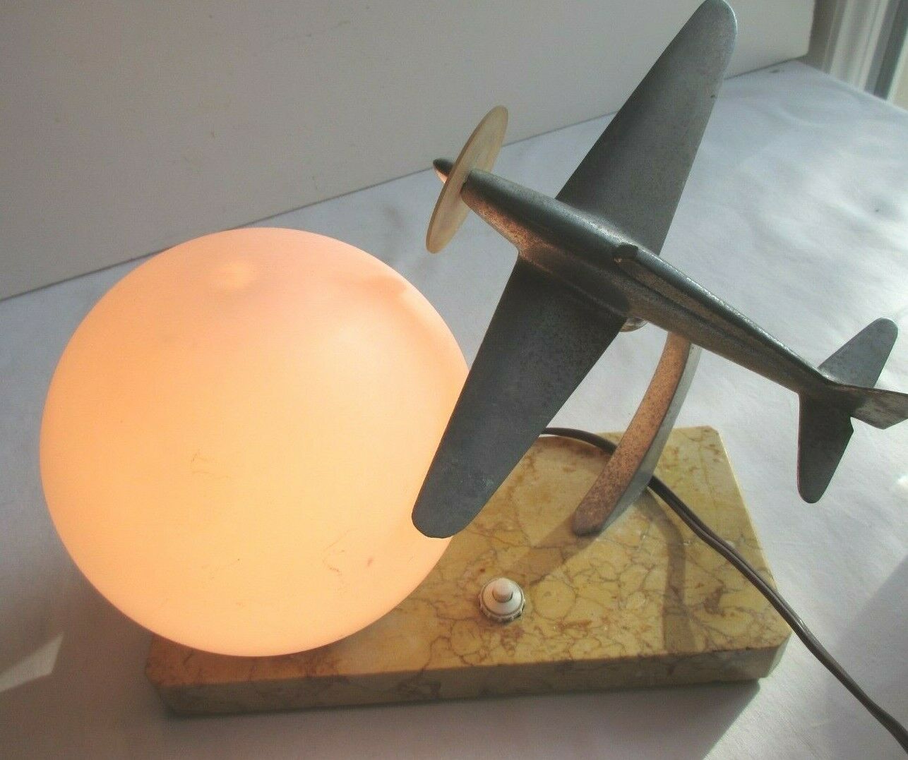 Art deco table lamp aluminum airplane and ball tulip on marble terrace