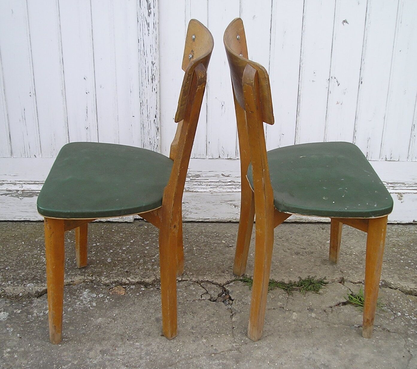 Pair of 1960 chairs, green skai and wood