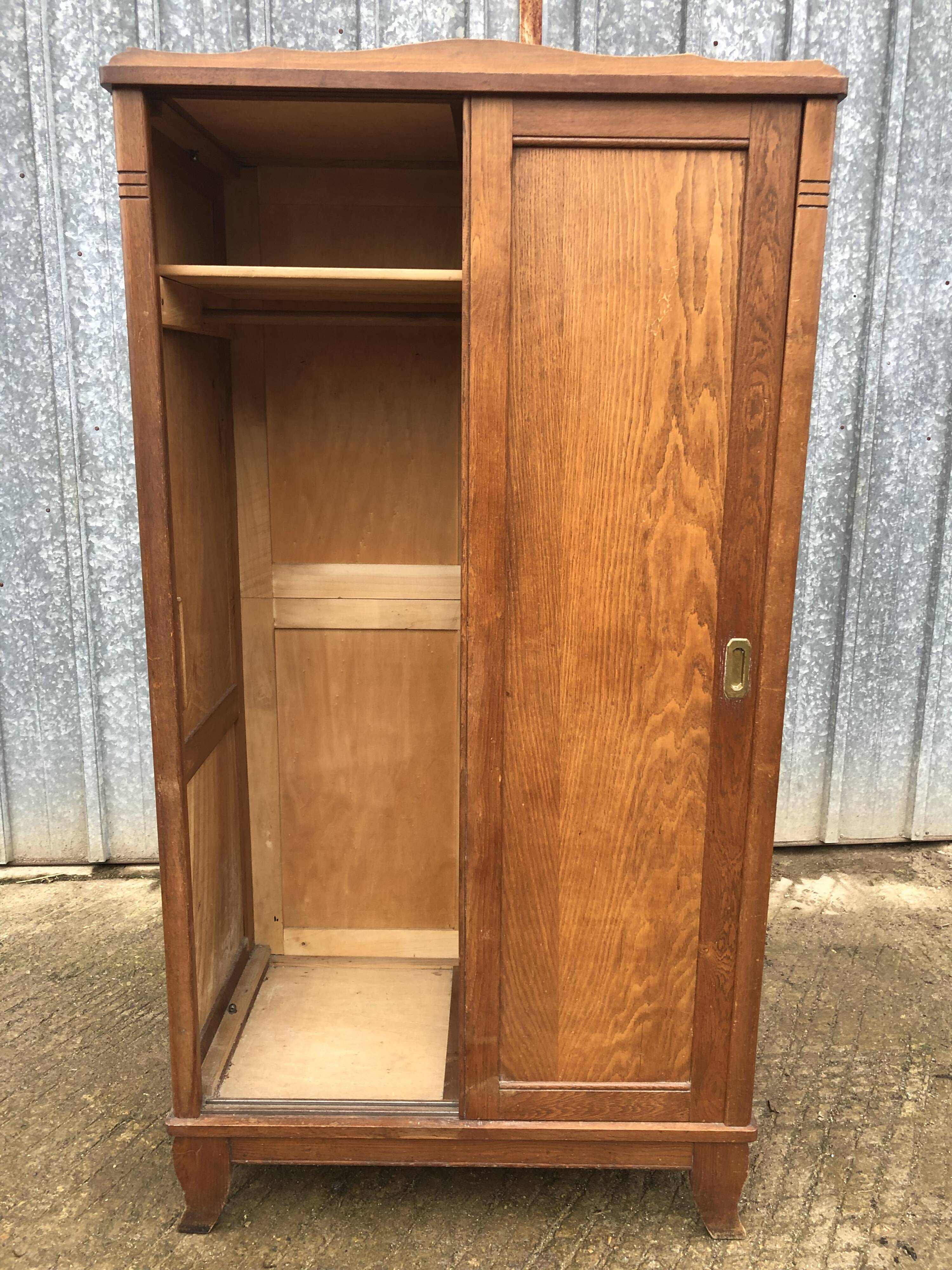 Vintage reconstruction period oak wardrobe with 2 sliding doors.